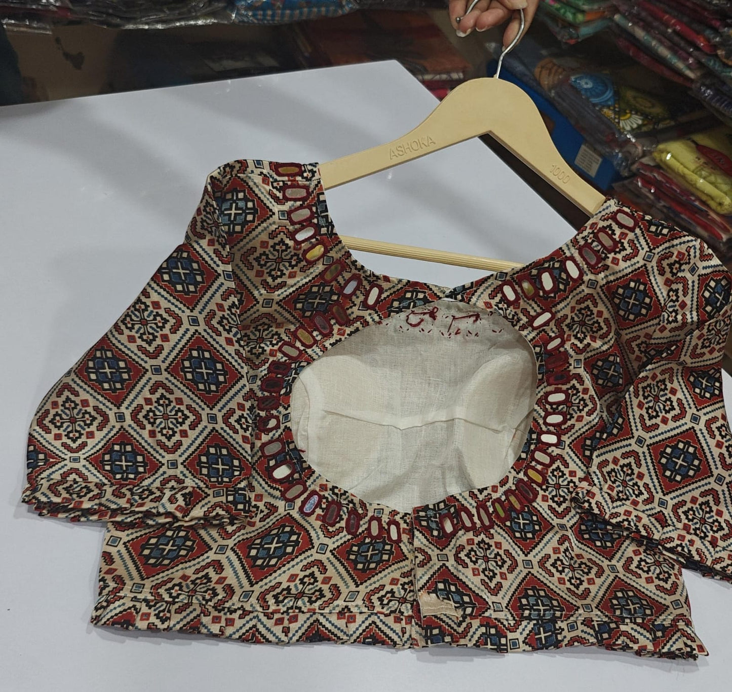 Ivory ajrakh print pure gaji silk with mul lining real mirror work length 15 inch...bust size 40 margins two two inches on both sides (A886)