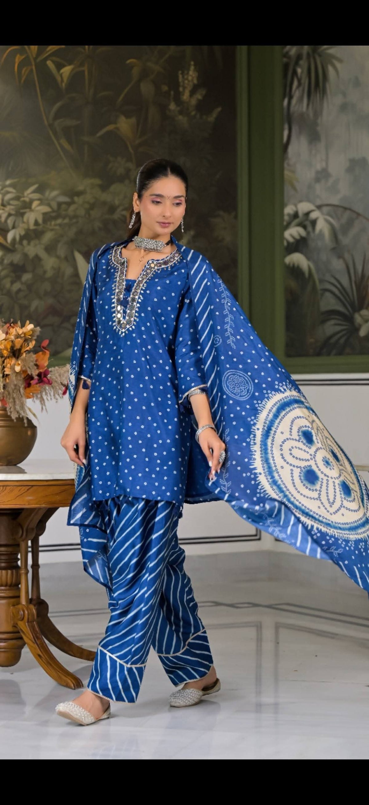Pure dola silk with heavy neck work and paired with farshi salwar three piece set (C525)